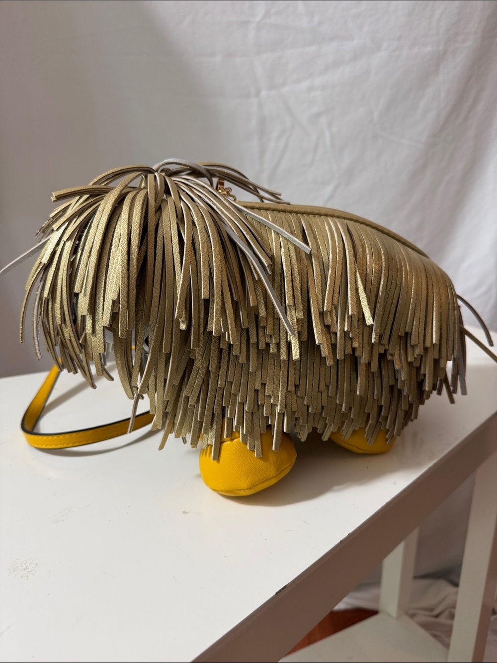 Fringed Gold Shaggy Dog Crossbody Bag with Yellow Accents